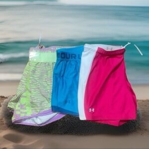 Bundle of 2 Under Armour Shorts and 1 pair of Nike Shorts, Women’s size Small